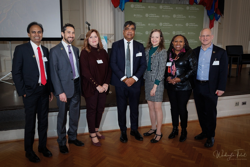 Center: Dr. Pushpam Kumar, Chief Environmental Economist and Senior Economic Advisor, UN Environment Programme; and from left to right from UNFCU: Prasad Surapaneni, SVP and Chief Information Officer; Patrick Siler, Senior Associate General Counsel; Pamela Agnone, EVP; Liz Philippe, Senior Manager, CSR and Media Relations; Yma Gordon, Vice President of Corporate Social Responsibility & Impact and the Executive Director of the UNFCU Foundation, John Lewis, President/CEO